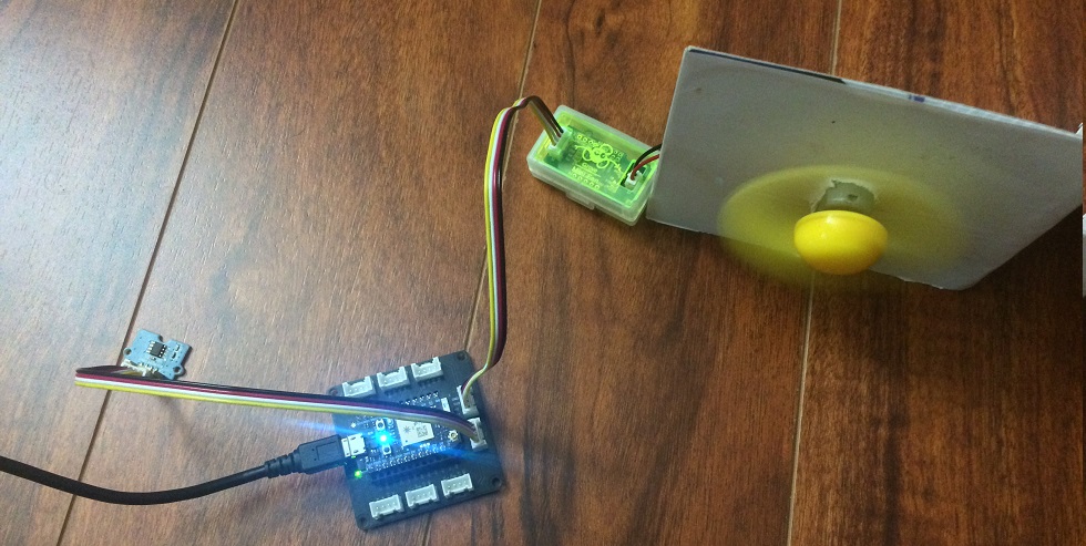 a picture showing temperature sensor and fan connected to grove shield 